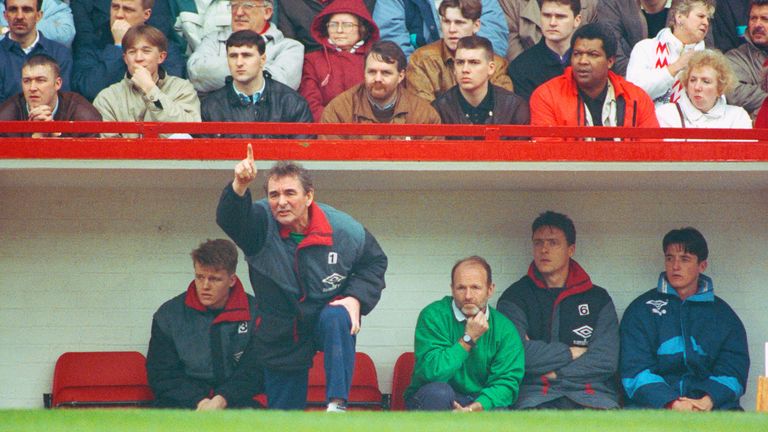 NOTTINGHAM, UNITED KINGDOM - 02 FEBRUARY: Nottingham Forest coach Brian Clough (2nd left) scores a point that coach Archie Gemmill (c) saw during a League Division One match in the 1990/91 season at City Ground, Nottingham, England.