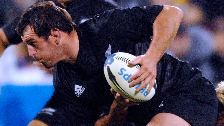 FILE - New Zealand All Blacks... Carl Hayman, left, is tackled by South African Springboks... Wynand Olivier in the international Tri Nations rugby test at Jade Stadium, in Christchurch, New Zealand, July 14, 2007. Hayman has revealed he has been diagnosed with early-onset dementia at the age of 41. (AP Photo/NZPA, Ross Setford, FILE)