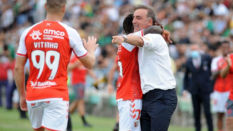 Braga manager Carlos Carvalhal embraces Roger Fernandes after he scores in the 5-0 Portuguese Cup win over Moitense (Sipa US/Alamy Stock Photo)