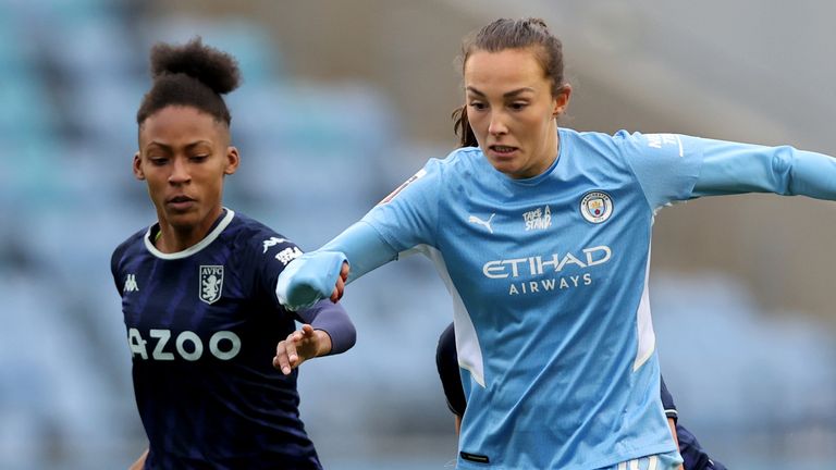 Caroline Weir of Manchester City is tracked by Aston Villa's Elisha N'Dow