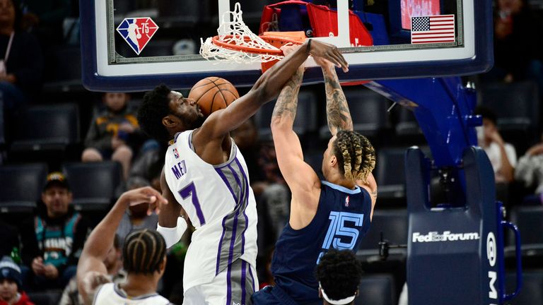 Memphis Grizzlies forward Brandon Clarke dunks against Sacramento Kings forward Chimezie Metu