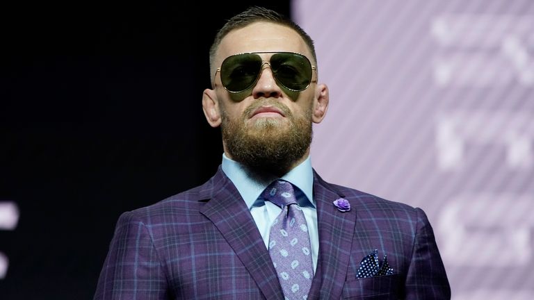 Conor McGregor walks on stage during a news conference for a UFC 264 mixed martial arts bout Thursday, July 8, 2021, in Las Vegas