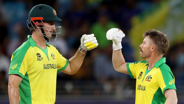 Mitchell Marsh (L) and David Warner shared a stand of 92 from 59 balls as Australia beat New Zealand to win the 2021 T20 World Cup in Dubai (Associated Press)