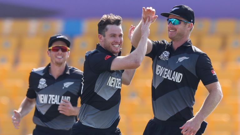 New Zealand's Adam Milne 9L) celebrates a wicket with Jimmy Neesham at the T20 World Cup (Associated Press)