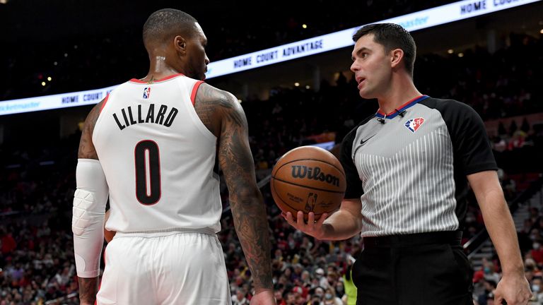 Damian Lillard in discussion with a referee during the match against the Los Angeles Lakers