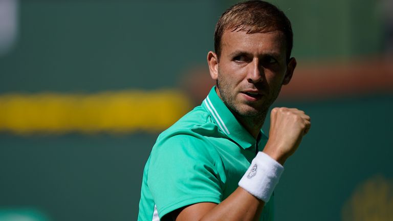 Dan Evans, of Britain, reacts to winning a point against Diego Schwartzman, of Argentina, at the BNP Paribas Open tennis tournament Monday, Oct. 11, 2021, in Indian Wells, Calif. (AP Photo/Mark J. Terrill)