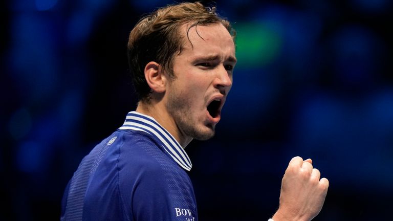 Russia's Daniil Medvedev celebrates after a winning point as he plays Germany's Alexander Zverev during their ATP Finals singles tennis match, at the Pala Alpitour in Turin, Tuesday, Nov. 16, 2021. (AP Photo/Luca Bruno)