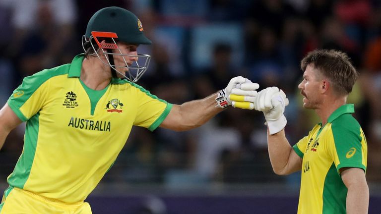 Australia's David Warner (right) fist-bumps Mitchell Marsh (left) in the T20 World Cup final against New Zealand