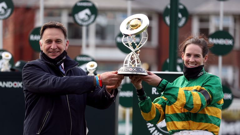 De Bromhead and Rachael Blackmore hold aloft the Grand National trophy