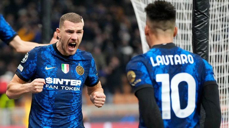 Edin Dzeko scored twice for Inter Milan as they reached the last 16