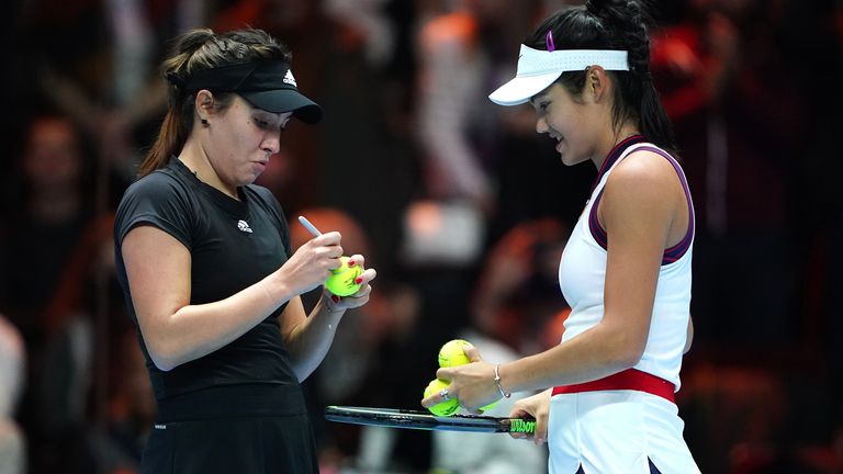 Great Britain's Emma Raducanu (right) and Romania's Elena-Gabriela Ruse sign tennis balls after the ATP Champions Tour 2021 held at the Royal Albert Hall, London. Picture date: Sunday November 28, 2021.