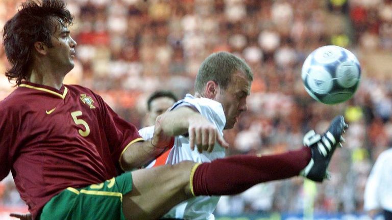 Fernando Couto of Portugal clashes with Alan Shearer of England at Euro 2000