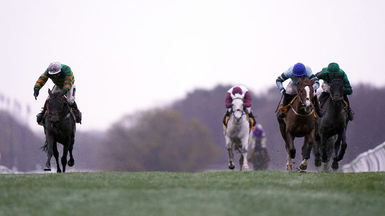 Epatante, left, and Not So Sleepy, right, hit the line together in the Fighting Fifth at Newcastle