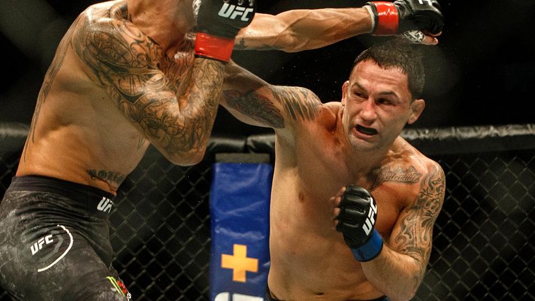 Frankie Edgar (R) during his bout with Max Holloway at UFC 240 (pic: Jason Franson/The Canadian Press via AP)