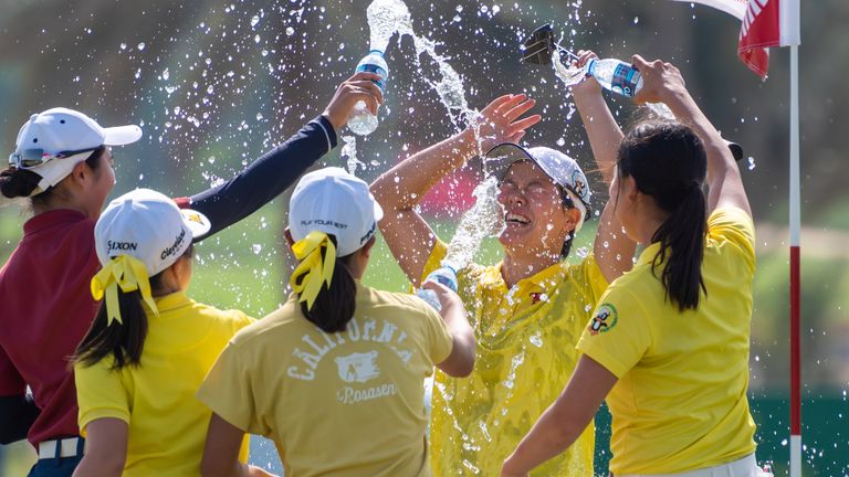 Mizuki Hashimoto of Japan celebrates with her fellow Japanese competitors as she wins the Women's Amateur Asia-Pacific championship. [Credit: R&A]
