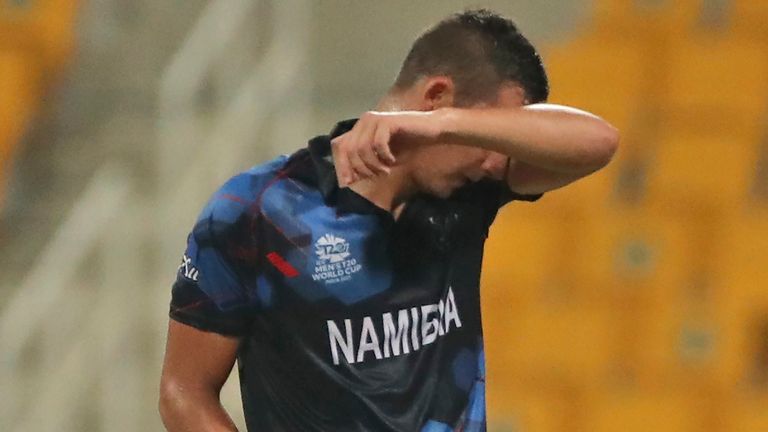 Namibia's JJ Smit reacts after being hit for 24 in an over by Pakistan's Mohammad Rizwan at the T20 World Cup match in Abu Dhabi (Associated Press)