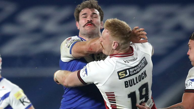 Wigan Warriors v St Helens - Betfred Super League - Grand Final - KCOM Stadium
St Helens' Alex Walmsley is tackled by Wigan Warriors' Joe Bullock during the Betfred Super League Grand Final at the KCOM Stadium, Hull.