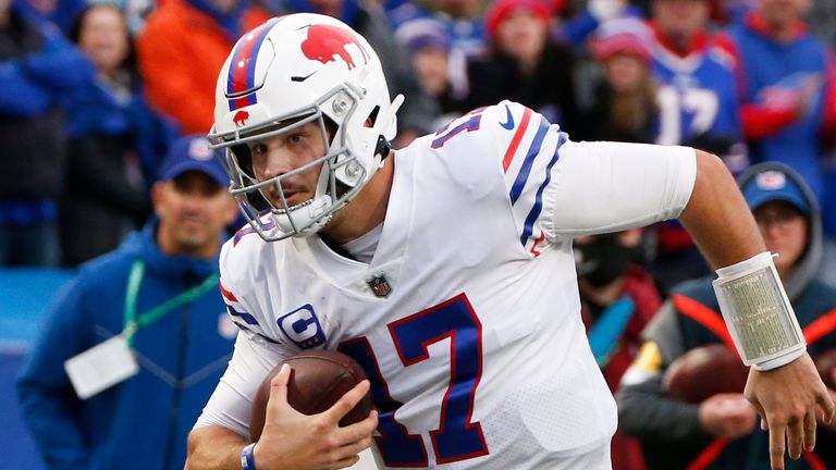 Buffalo Bills quarterback Josh Allen (17) carries the ball during the second half of an NFL football game against the Miami Dolphins in Orchard park, N.Y., Sunday Oct. 31, 2021. (AP/ Photo Jeffrey T. Barnes)