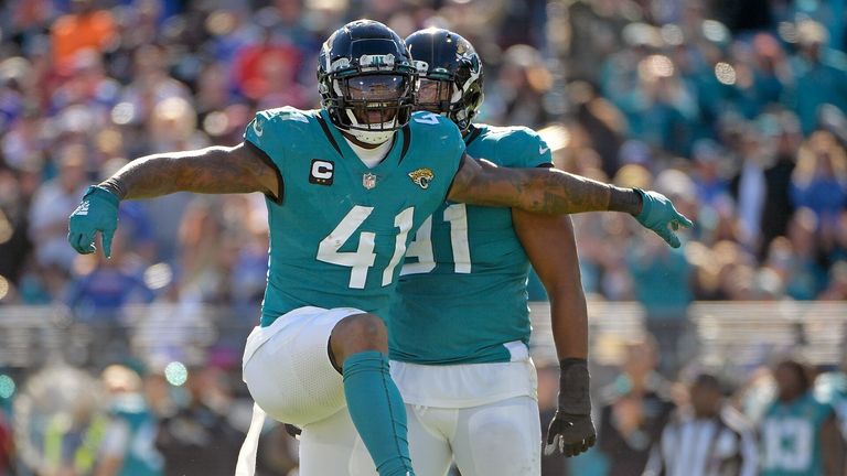 Jacksonville Jaguars linebacker Josh Allen (41) celebrates after sacking Buffalo Bills quarterback Josh Allen during the first half of an NFL football game,