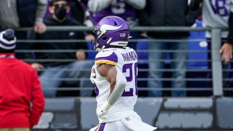 Minnesota Vikings running back Kene Nwangwu (26) returns a kickoff for a touchdown during the second half of an NFL football game against the Baltimore Ravens