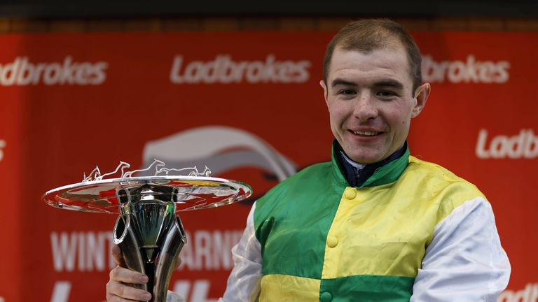 Charlie Deutsch poses with the Ladbrokes Trophy after victory on Cloudy Glen at Newbury
