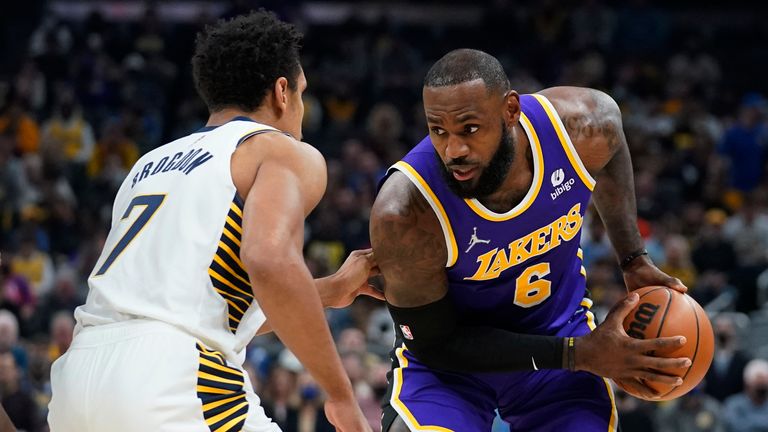 Los Angeles Lakers&#39; LeBron James is defended by Indiana Pacers&#39; Malcolm Brogdon