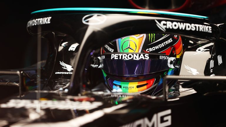 Lewis Hamilton prepares to drive in the garage Qatar GP practice