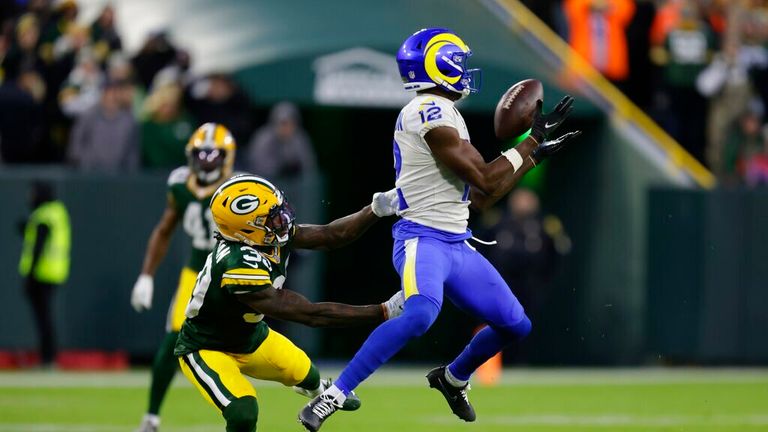 Los Angeles Rams&#39; Van Jefferson catches a touchdown pass in front of Green Bay Packers&#39; Chandon Sullivan during the first half of an NFL football game Sunday, Nov. 28, 2021, in Green Bay, Wis. (AP Photo/Matt Ludtke)