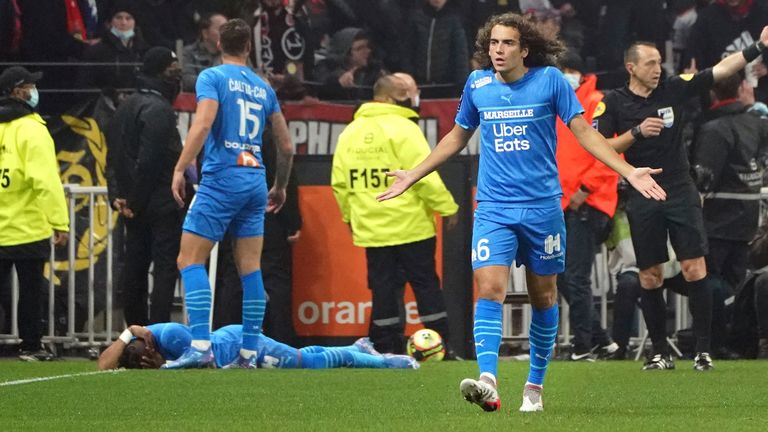 Marseille's Matteo Guendouzi gestured as his team-mate Dimitri Payet lay on the field