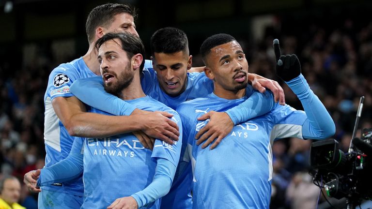 Manchester City celebrate after Gabriel Jesus' winner against PSG