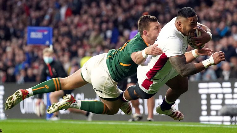 England's Manu Tuilagi breaks clear to score against South Africa