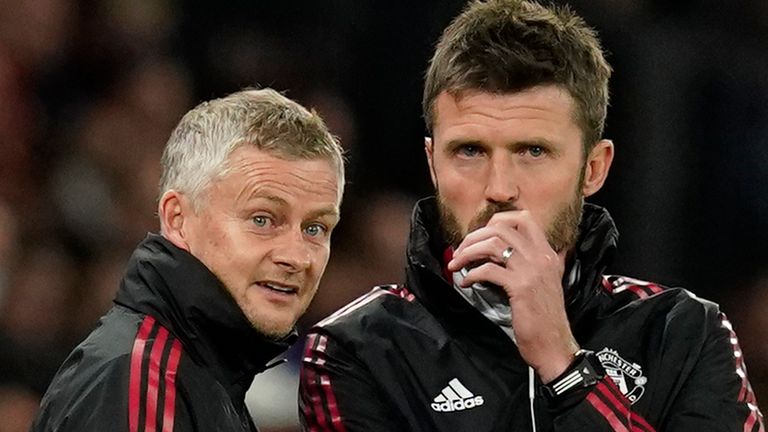Michael Carrick (left) has been placed in temporary charge of Manchester United following Ole Gunnar Solskjaer's sacking (AP)