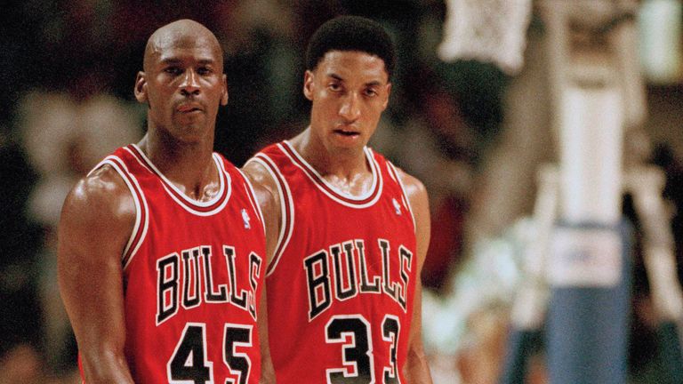 Chicago Bulls Michael Jordan and Scottie Pippen return to the floor after a time out in the fourth quarter against the Indiana Pacers, Sunday, March 19, 1995, Indianapolis