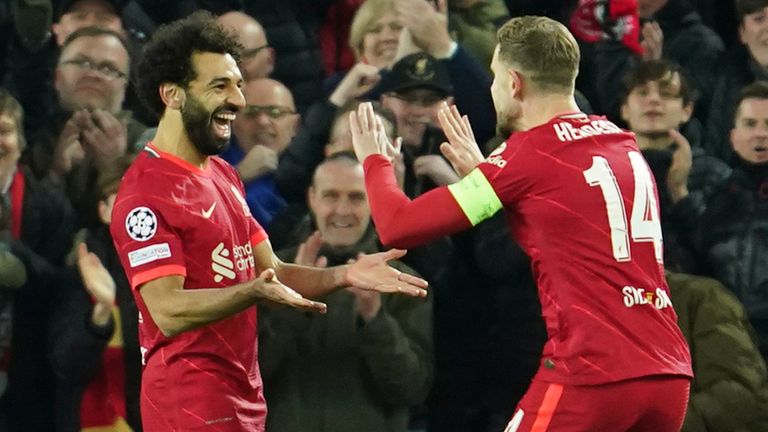 Mohamed Salah celebrates with Jordan Henderson after scoring Liverpool's second goal