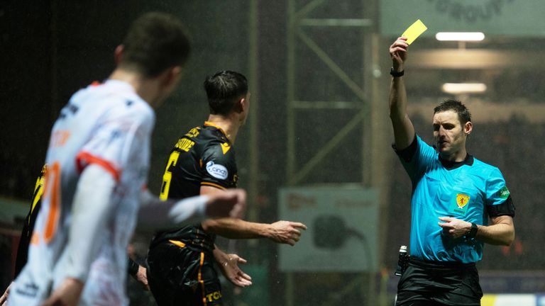 MOTHERWELL, SCOTLAND - NOVEMBER 30: Referee Steven McLean shows a second yellow card to Barry Maguire during a cinch Premiership match between Motherwell and Dundee United at Fir Park, on November 30, 2021, in Motherwell, Scotland.  (Photo by Craig Foy / SNS Group)