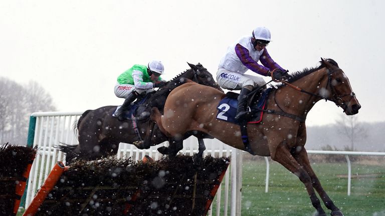 Mr Glass wins The French Furze Novices' Hurdle in the snow at Newcastle