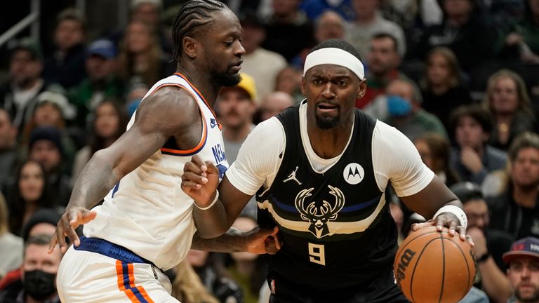Milwaukee Bucks' Bobby Portis tries to drive past New York Knicks' Julius Randle during the second half of an NBA basketball game Friday, Nov. 5, 2021, in Milwaukee. The Knicks won 113-98.