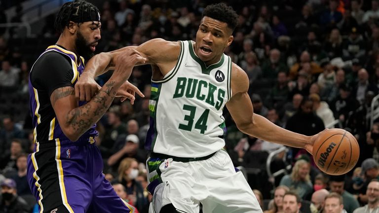 Milwaukee Bucks&#39; Giannis Antetokounmpo tries to get past Los Angeles Lakers&#39; Anthony Davis during the second half of an NBA basketball game Wednesday, Nov. 17, 2021, in Milwaukee. The Bucks won 109-102.