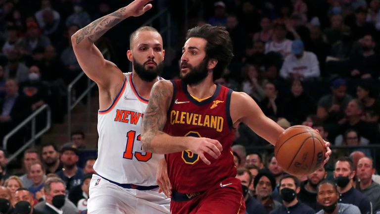 Cleveland Cavaliers guard Ricky Rubio (3) drives to the basket against New York Knicks guard Evan Fournier (13) during the first half of an NBA basketball game in New York, Sunday, Nov. 7, 2021.