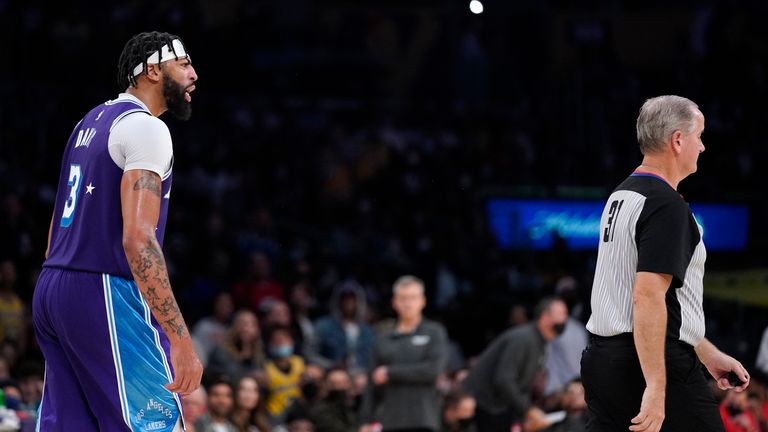 Los Angeles Lakers forward Anthony Davis, left, questions referee Scott Wall after receiving his second technical foul during the second half of an NBA basketball game against the Chicago Bulls Monday, Nov. 15, 2021, in Los Angeles. The Bulls won 121-103.
