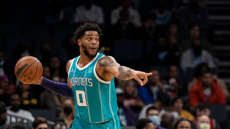 Charlotte Hornets forward Miles Bridges (0) brings the ball up court during the first half of an NBA basketball game against the Portland Trail Blazers, Sunday, Oct. 31, 2021, in Charlotte, N.C. (AP Photo/Matt Kelley)