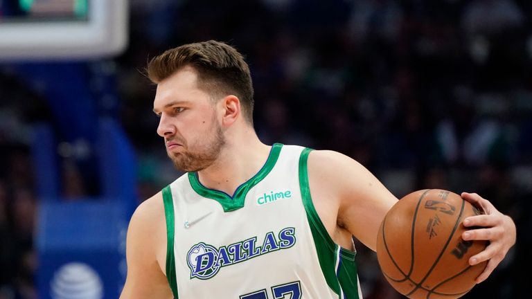 Dallas Mavericks guard Luka Doncic (77) dribbles during the first quarter of an NBA basketball game against the Washington Wizards in Dallas, Saturday, Nov. 27, 2021. (AP Photo/LM Otero)


