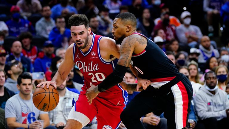 Philadelphia 76ers&#39; Georges Niang, left, tries to get past Portland Trail Blazers&#39; Damian Lillard during the second half of an NBA basketball game, Monday, Nov. 1, 2021, in Philadelphia.