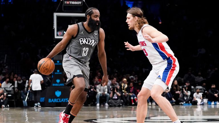 Brooklyn Nets guard James Harden (13) drives against Detroit Pistons forward Kelly Olynyk (13) during the second half of an NBA basketball game Sunday, Oct. 31, 2021, in New York. (AP Photo/Corey Sipkin)


