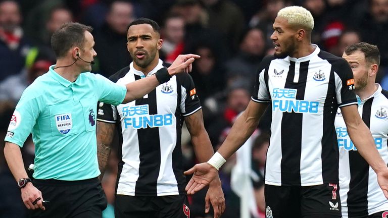 Newcastle players appeal to referee Stuart Attwell after Arsenals second goal