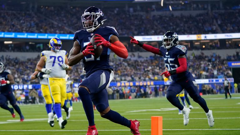 Tennessee Titans safety Kevin Byard intercepts a pass thrown by Los Angeles Rams quarterback Matthew Stafford and returns it 24 yards for a touchdown