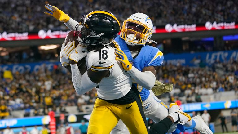 Pittsburgh Steelers wide receiver Diontae Johnson (18) makes a catch in the end zone for a touchdown as Los Angeles Chargers cornerback Asante Samuel Jr. defends during the first half of an NFL football game as Sunday, Nov. 21, 2021, in Inglewood, Calif.