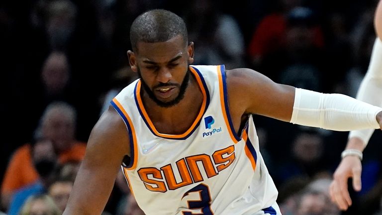 Phoenix Suns guard Chris Paul (3) regains control of the ball against New Orleans Pelicans guard Nickeil Alexander-Walker (6) during the second half of an NBA basketball game Tuesday, Nov. 2, 2021, in Phoenix. The Suns won 112-100.