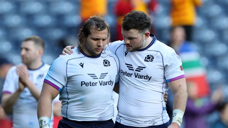 Scotland's Pierre Schoeman (left) and Ewan Ashman look dejected