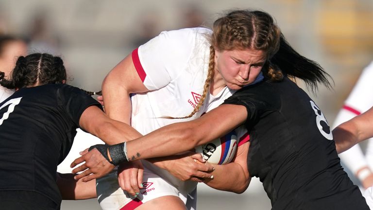 England's Poppy Cleall is tackled by New Zealand's Les Elder (left) and Dhys Faleafaga during the Women's Autumn International match at Sandy Park, Exeter. Picture date: Sunday October 31, 2021.